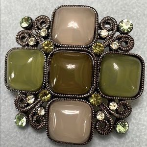 Vintage gorgeous hues of green brooch that can be worn as a pendent.
